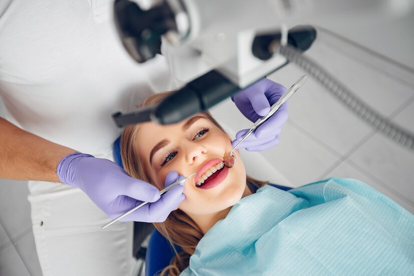 beautiful girl sitting dentist s office 1157 21014